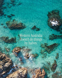 Aerial view of clear turquoise ocean water over rocky coastline, with the centered text 'Western Australia doesn't do things by halves.'.
